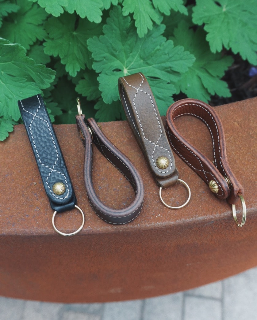 Leather Key Fobs with snap attachment, embroidered detail and split ring.