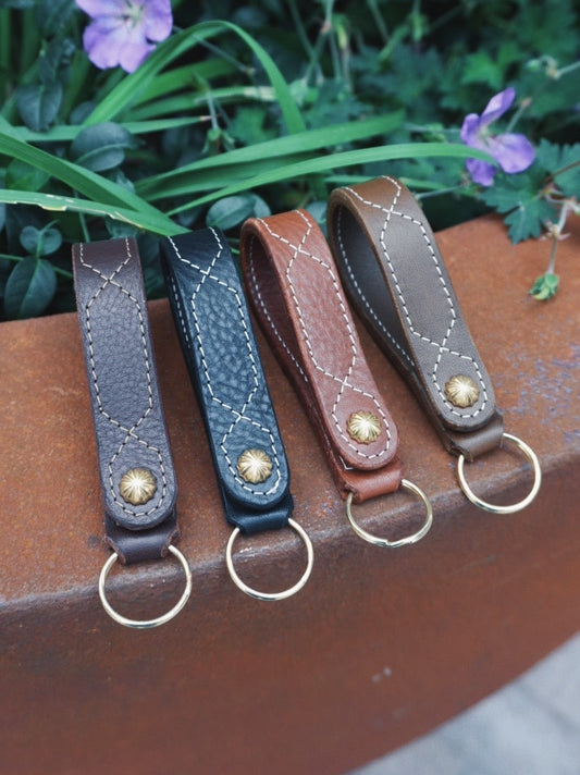 Leather Key Fobs with snap attachment, embroidered detail and split ring.